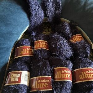Patons Allure Yarn in Jewel Sapphire Blue. Eight skeins plus a bonus bit